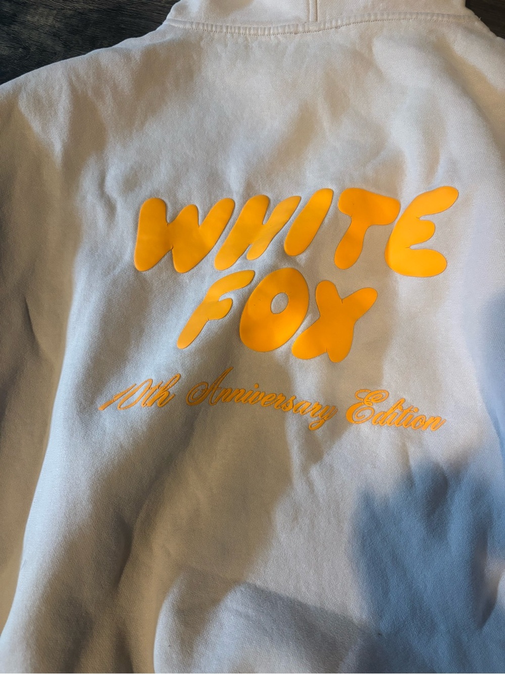 White Fox Boutique White Hoodie with Black Tag Detail